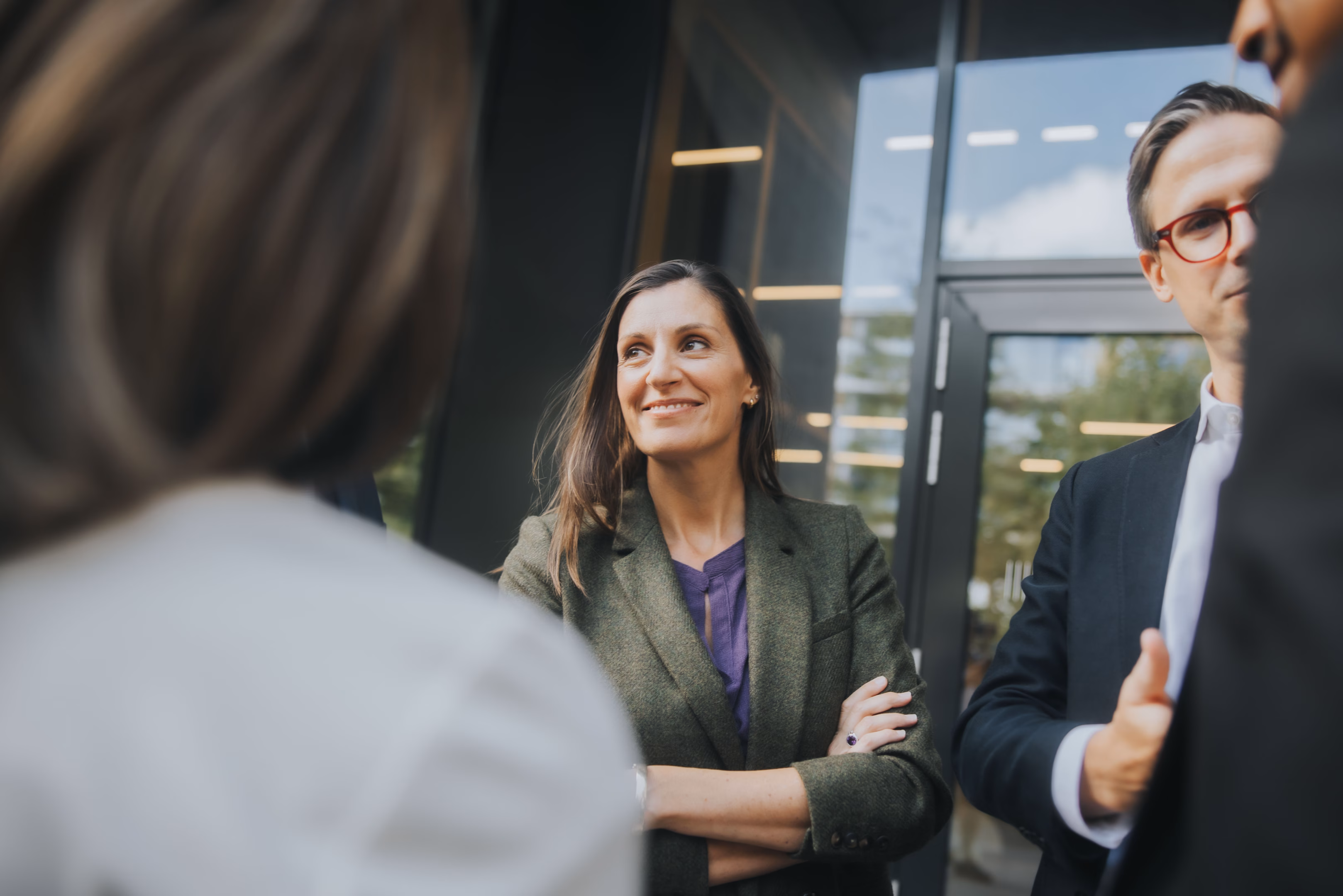 Colleagues talking at a group session